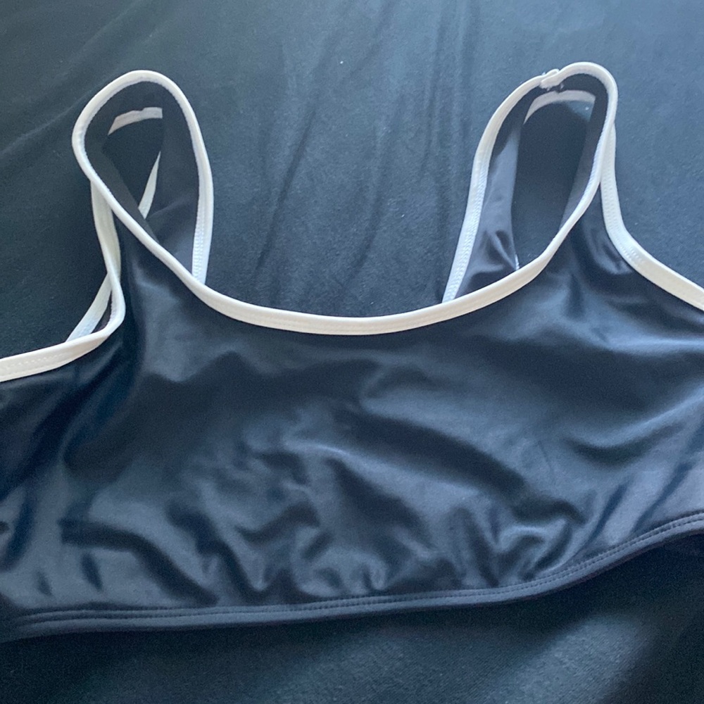 This is a black and white swimsuit top from Shein. It’s size XS.